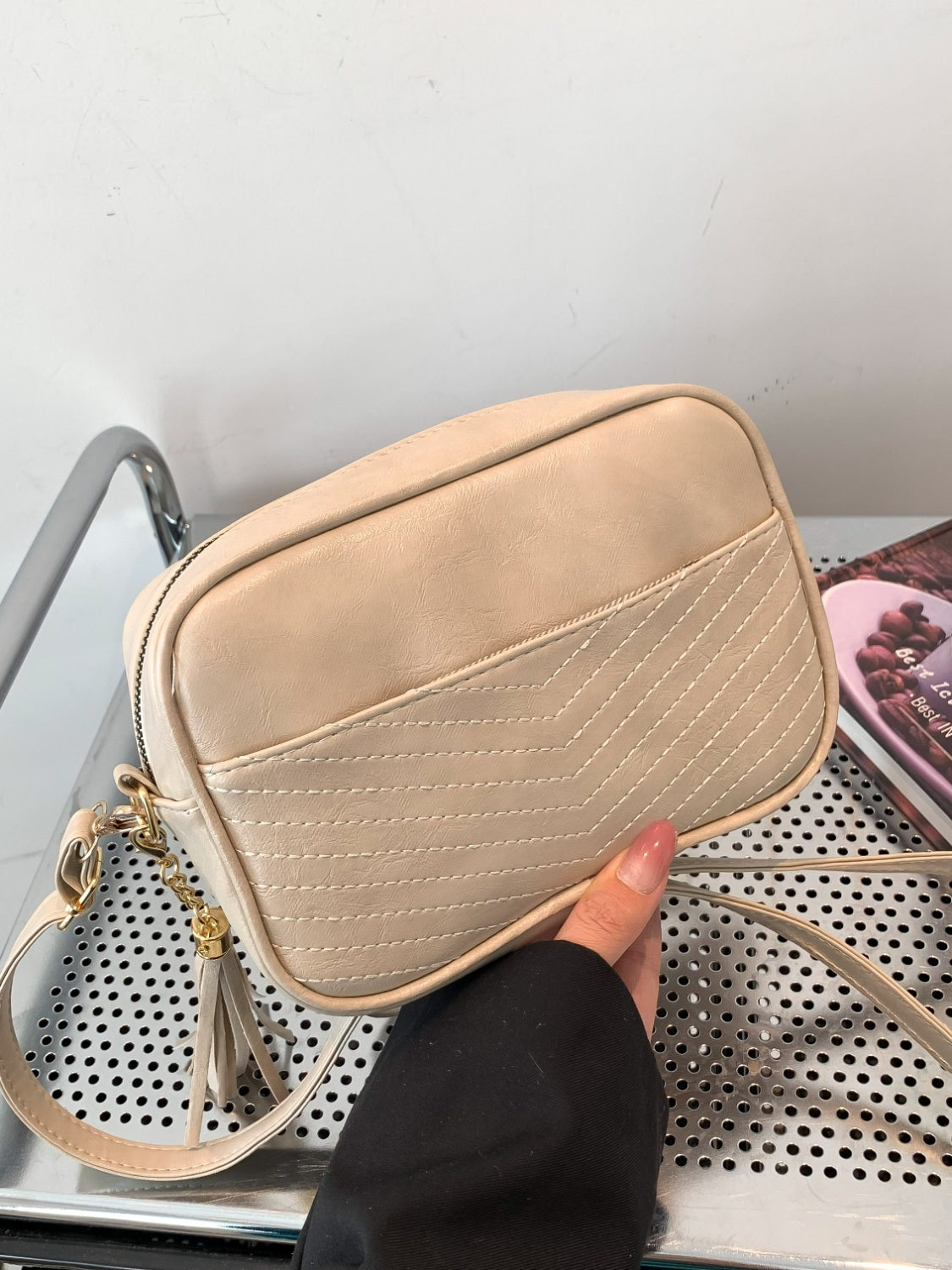 Bolso bandolera con correa de piel estampada