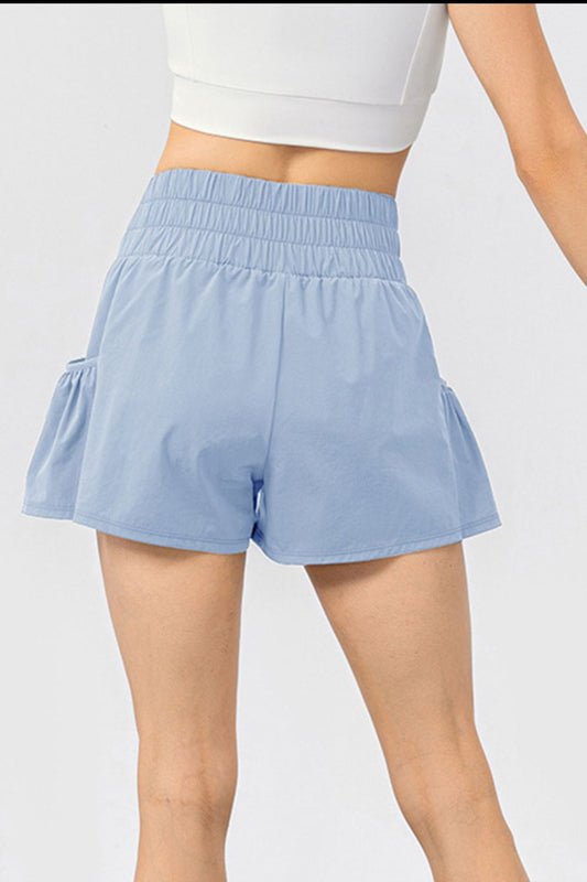 Pantalones cortos deportivos con bolsillos y cintura elástica